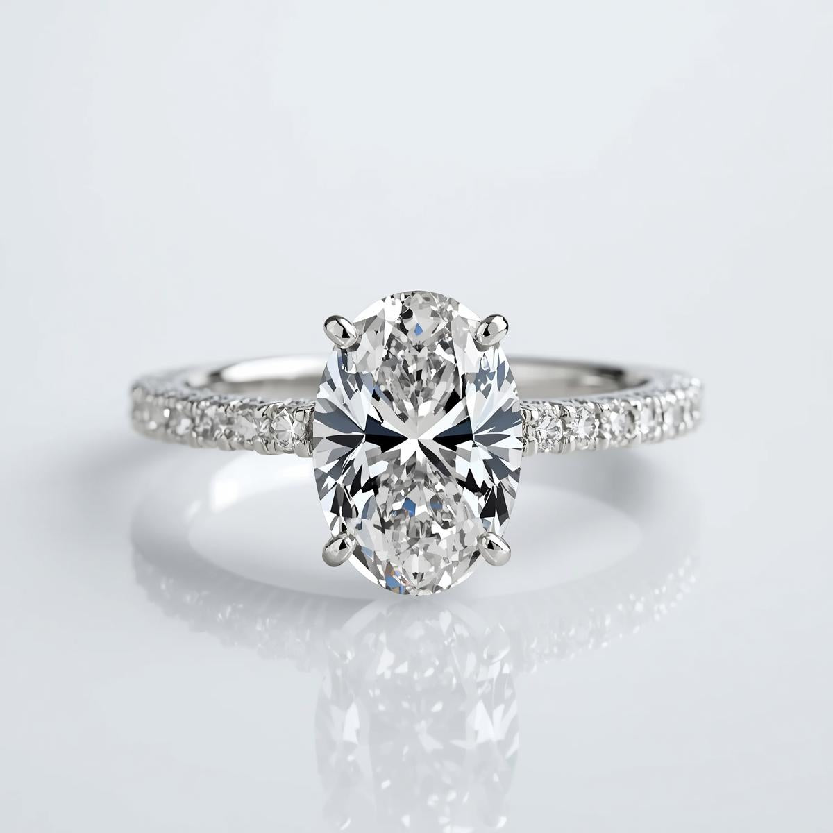 טבעת יהלום מעבדה 3 קראט IGI בחיתוך אובל עם אבני צד במבצע רק ב-6.400 ש"ח במקום 14.500 ORA